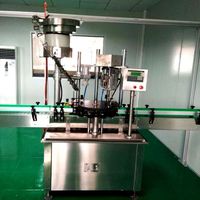 Machine de sertissage automatique de capsules à anneau HL-XGH01 pour les boissons gazeuses, les boissons, la bière, les bouteilles en verre avec un distributeur de capsules