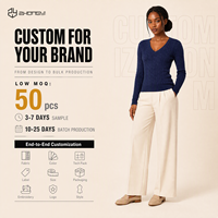 Pull-over côtelé respirant à col en V et manches longues pour femme, personnalisé en gros (ODM) - Vêtements et hauts pour femme