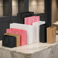 Sacs en papier kraft biodégradables de luxe personnalisés en gros avec poignées en papier, emballage cadeau haut de gamme pour la vente au détail