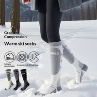 Chaussettes de sport d'extérieur en laine tricotée épaissie pour hommes et femmes, chaussettes longues chaudes pour la neige, chaussettes de ski professionnelles d'hiver à séchage rapide