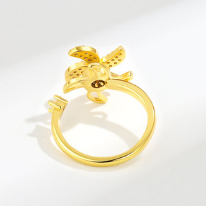 Anillo giratorio de molino de viento doble con micro pavé de circonitas, chapado en oro sobre cobre, ajustable, estilo francés, joyería antiestrés para mujer - Product Image 4