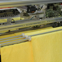 Machine à coudre à quatre côtés pour serviettes en microfibre à automatisation intelligente, idéale pour les usines de serviettes en bambou et en fibres recyclées