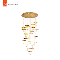 Lustre de luxe Golden Lotus, suspension linéaire en forme de feuille de lotus en bronze antique