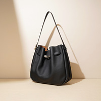 Sac seau en cuir véritable haut de gamme pour femme, élégant, tendance automne, sac à bandoulière polyvalent avec fermeture éclair et chaînes, grande capacité