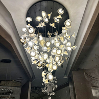 Lustre en verre cristal à pétales irréguliers de luxe, suspension créative sculpturale pour hall d'ascenseur et éclairage de projet à plafond haut