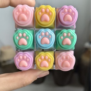 คีย์แคปซิลิโคนรูปอุ้งเท้าแมว 9 ปุ่ม สีสันทันสมัย ของเล่นกดนิ้วคลายเครียด - Product Image 4