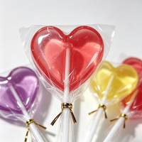 Groothandel op maat gemaakte halal transparante hartvormige harde lolly's gemengde kleuren fruit smaak snoepjes voor Valentijnsdag kinderfeestje cadeau OEM