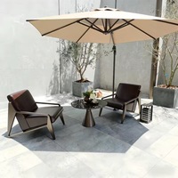 Ensemble de fauteuils de jardin de luxe moderne avec structure métallique, chaise et table de patio en cuir imperméable pour villa, hôtel, cour.