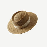 Vente en gros de chapeaux de paille pour femmes été surdimensionné soleil naturel herbe seau pliable Panama personnalisé OEM canotier de luxe personnalisé