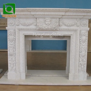Marco de Chimenea Tallado a Mano en Mármol Blanco Natural con Grabado de Pequeño Ángel y Flores para Decoración de Interiores - Product Image 2