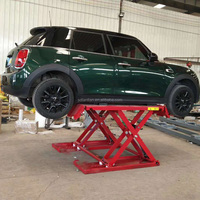 Elevador de tijera para coche de 220V/elevador de puente solución de elevación de vehículo eficiente