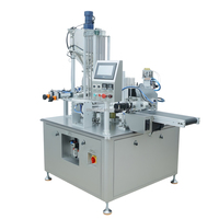 Machine d'emballage automatique rotative à double tête pour sauces liquides et pâtes, idéale pour le remplissage et la scellage des coupelles de sauce – Offre Spéciale