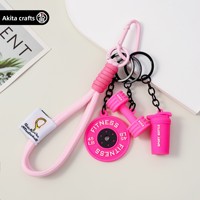 Porte-clés créatif sportif en PVC en forme d'haltère, mini pendentif haltère, breloque pour sac à dos d'étudiant ou voiture, style moderne et minimaliste