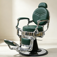 Fauteuil de barbier de luxe rétro vert avec coutures, inclinable hydrauliquement et pivotant, pour salon de coiffure