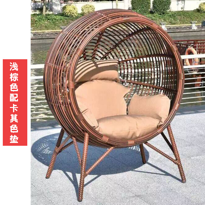 Sedia rotonda singola in rattan a forma di nido d'uccello, colore curry chiaro, con cuscino