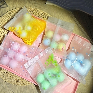 Balle anti-stress souple et piquante de couleur bonbon, faite à la main, en forme de boule Tangyuan, à presser, vente directe d'usine - Product Image 4