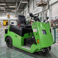 La Chine fournisseur de remorquage d'avion 6000kgs 6 tonnes de bagages de l'aéroport remorqueur de la batterie de remorquage assis de camion électrique tracteur de remorquage pour la vente