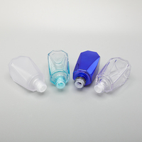Flacon compte-gouttes 50 ml en PETG pour sérum et lotion d'huiles essentielles, emballage cosmétique pour soins de la peau avec bouton poussoir et sérigraphie