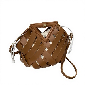 Sac seau bandoulière haut de gamme pour femme, nouveau style transfrontalier, en tissu tressé avec fermeture à cordon en polyester Tanjing - Product Image 1