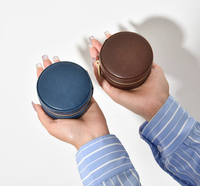 Étui à bijoux de voyage rond en cuir PU, boîte cylindrique à fermeture éclair, intérieur en velours, mini rangement pour bagues et boucles d'oreilles, vente en gros, personnalisation OEM