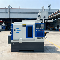 Kleine verticale zware-duty tweespindel automatische draaibank SN40 Fanuc CNC-besturing voor hobby-metaalbewerking in thuiswerkplaats