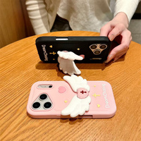 Nouvelle coque de téléphone en silicone avec support pliable en forme d'ailes d'ange pour iPhone 18 17 16 15 14 Pro Max, avec support croisé en caoutchouc et béquille arrière