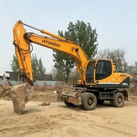 Excavatrice sur pneus Hyundai 210 d'occasion, modèle 2024, très populaire et très demandée, avec moteur Cummins, pompe hydraulique Kawasaki, moteur, engrenage et contrôle PLC