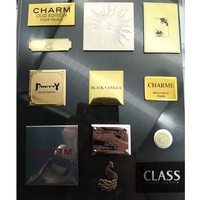 Étiquettes de parfum originales personnalisées d'usine pour bouteille en verre Autocollants métalliques de transfert de logo 3D en aluminium pour emballage