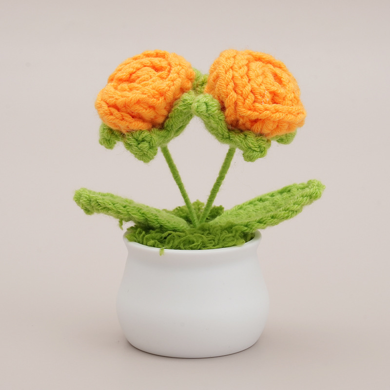 Double-headed rose with orange leaves