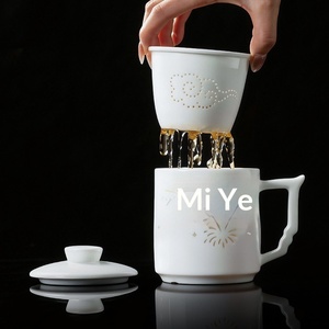 Tasse à thé en porcelaine exquise avec motif de feux d'artifice colorés, tasse en céramique Jingdezhen, tasse de bureau avec couvercle et filtre, tasse à thé avec séparation du thé - Product Image 1