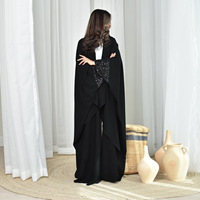 Abaya musulmane noire de luxe sur mesure en gros à Dubaï 2025 pour femmes, avec poignets à sequins, panneau à volants, robe modeste ouverte