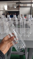 Machine de soufflage et de lavage automatique de bouteilles PET pour jus/eau, à cavité unique, 500 ml, 1000 BPH, contrôlée par PLC et entraînée par moteur