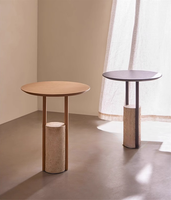 Table basse ronde de style italien moderne avec base en travertin pour appartement ou bureau