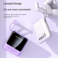 Vente en gros Mini portable câble de charge intégré chargeur de banque mobile haute capacité 10000 MA chargeur de téléphone portable universel
