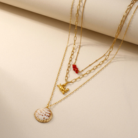 Collier pendentif rétro multi-éléments en perles de coquillage, exquis, plaqué or, en acier inoxydable, avec breloques cœur, fleur et feuille