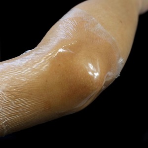 Bande adhésive médicale transparente à carreaux en film PU imperméable Anqisheng pour pansement et protection sous la douche - Product Image 3