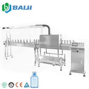 Full automatic 5L 10L beverage juice water bottles neck handle ring inserting pressing machine