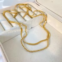 Collier en titane en acier inoxydable plaqué or 18 carats, motif torsades de pâte frite en os de serpent superposées