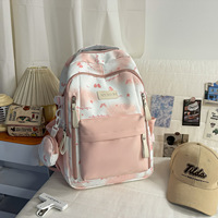 Nouveauté Sac à dos esthétique grande capacité Design unique Sac d'école mignon motif macaron Fermeture éclair Multiples poches Unisexe