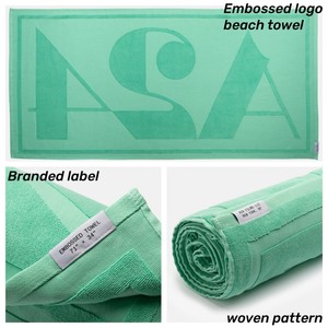 Toalla de baño tejida con textura jacquard personalizada de primera calidad Toalla en relieve con logotipo de 600GSM 100% algodón