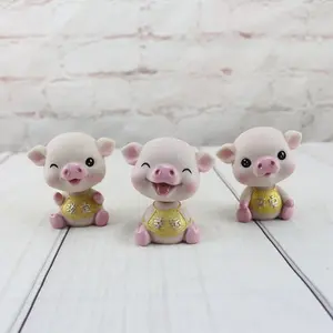 Cute happy shaking pigs can shake his head Cake decoration creative car decoration ornaments resin crafts figures