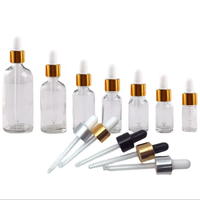 Vente en gros de flacons compte-gouttes en verre pour huiles essentielles de 5 ml à 100 ml avec couvercle en bambou, compte-gouttes doré, impression sérigraphique, couleur personnalisée