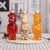 700ML 24OZ 500ML 16OZ Bouteille de café de jus d'ours en plastique PET avec couvercles Étiquette personnalisée