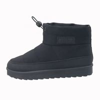 Vente en gros de bottes d'hiver pour femmes, chaussures d'hiver chaudes et antidérapantes à la mode noires personnalisées pour l'intérieur