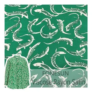 定制图案数码印花绿色跳跃鱼印花粘胶人造丝绸缎面料制作衣服