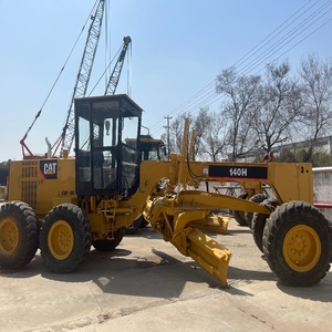 Niveleuse Caterpillar 140H avec lame avant et ripper arrière, équipement de construction d'occasion - Product Image 1