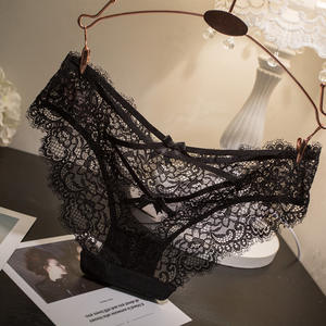 Braguitas de mujer sin costuras de elastano/poliéster con control medio, sexy, con encaje bordado, de talle bajo, con diseño cruzado hueco y transparente - Product Image 1