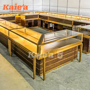 Vetrina Espositiva per Gioielleria di Alta Gamma Personalizzata all'Ingrosso Banco Rotondo in Vetro Oro Rosa Arredamento per Negozio di Gioielli - Product Image 1