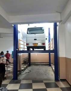 Puente de elevación de 4 postes para coche, elevador hidráulico de cuatro columnas para coche, sistema de elevación de estacionamiento para taller de reparación de vehículos - Product Image 2