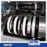 HX180 Nouvelle machine à coudre robotisée multi-stations de reliure de livres à couverture rigide, pilotée par vision, avec alimentation automatique et précision optimisée